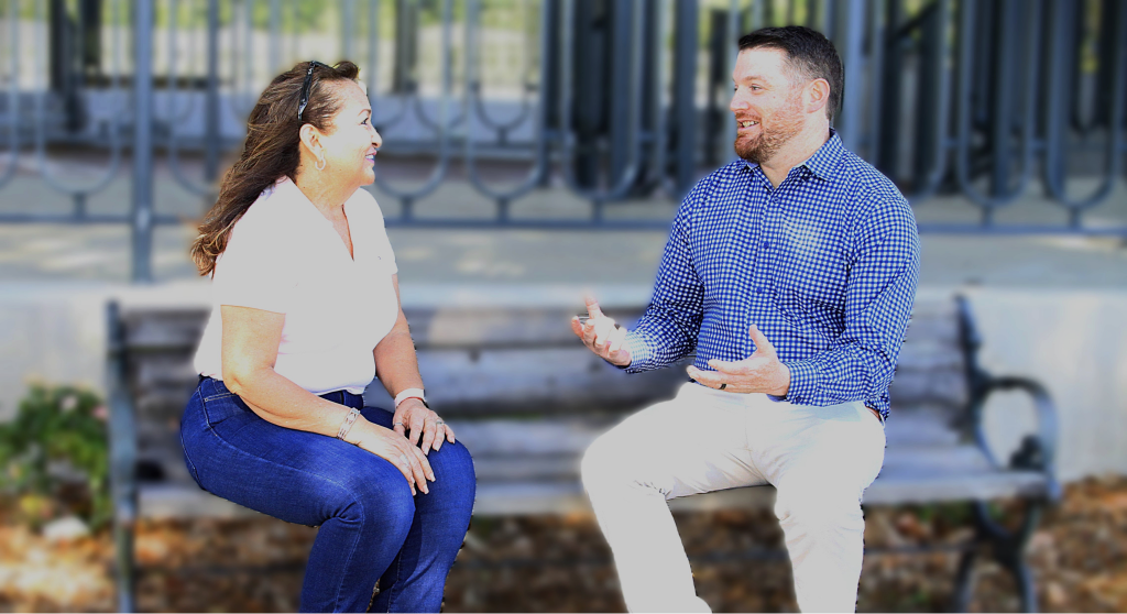 Medicare broker talking with a senior client